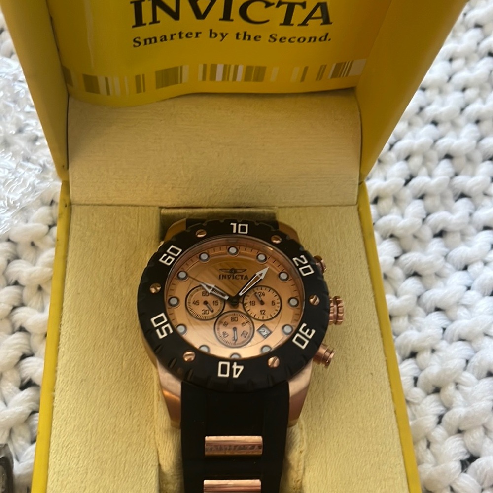 Men’s NWOT never worn Invicta sports watch with paperwork.